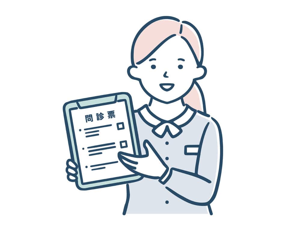 医療従事者が受付案内をしている